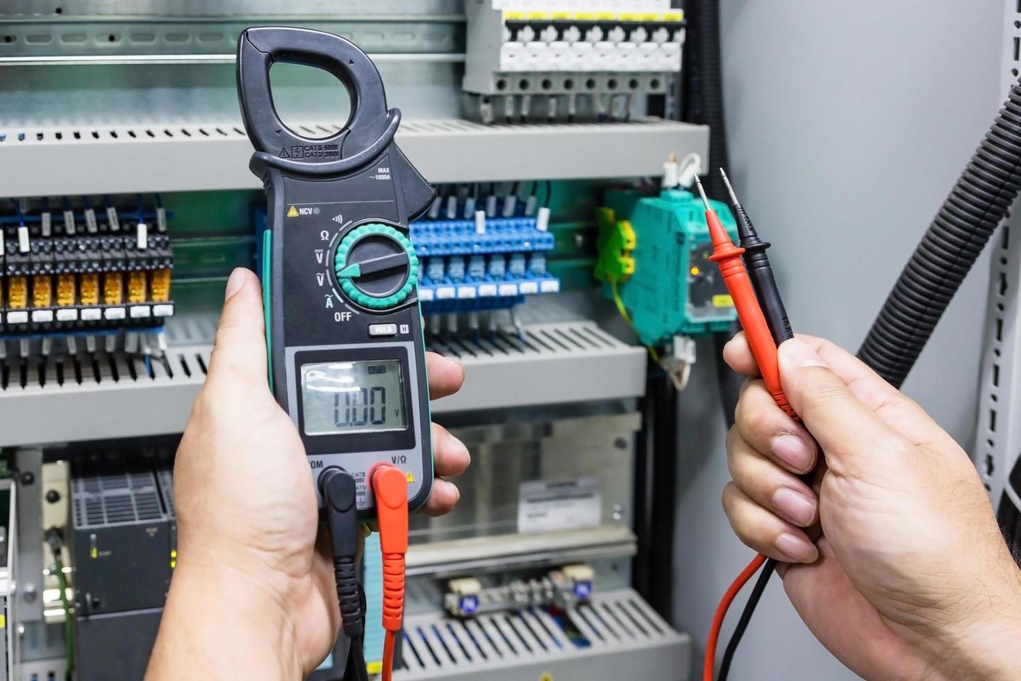 Person doing electrical work photo