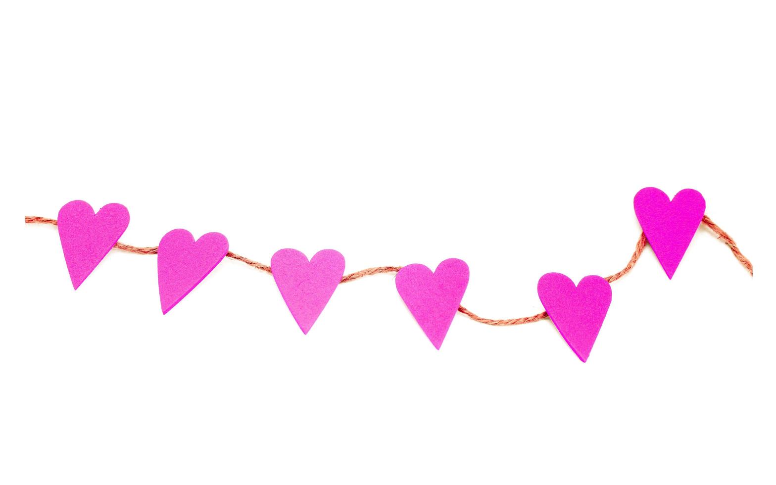 Pink hearts on a string photo