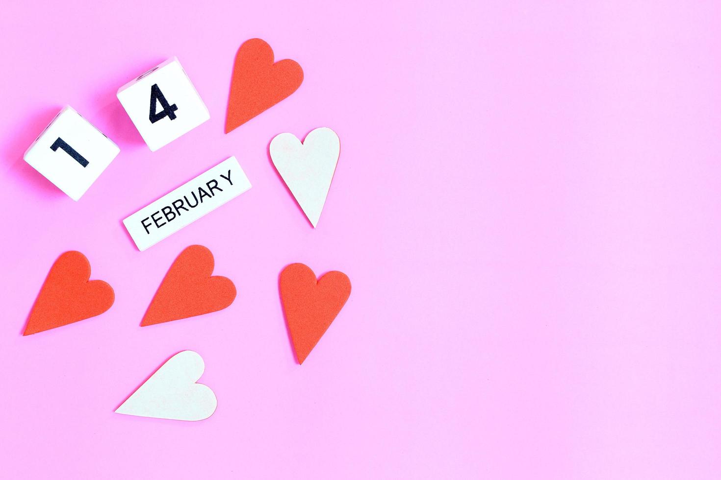 February 14 with hearts on a purple background photo