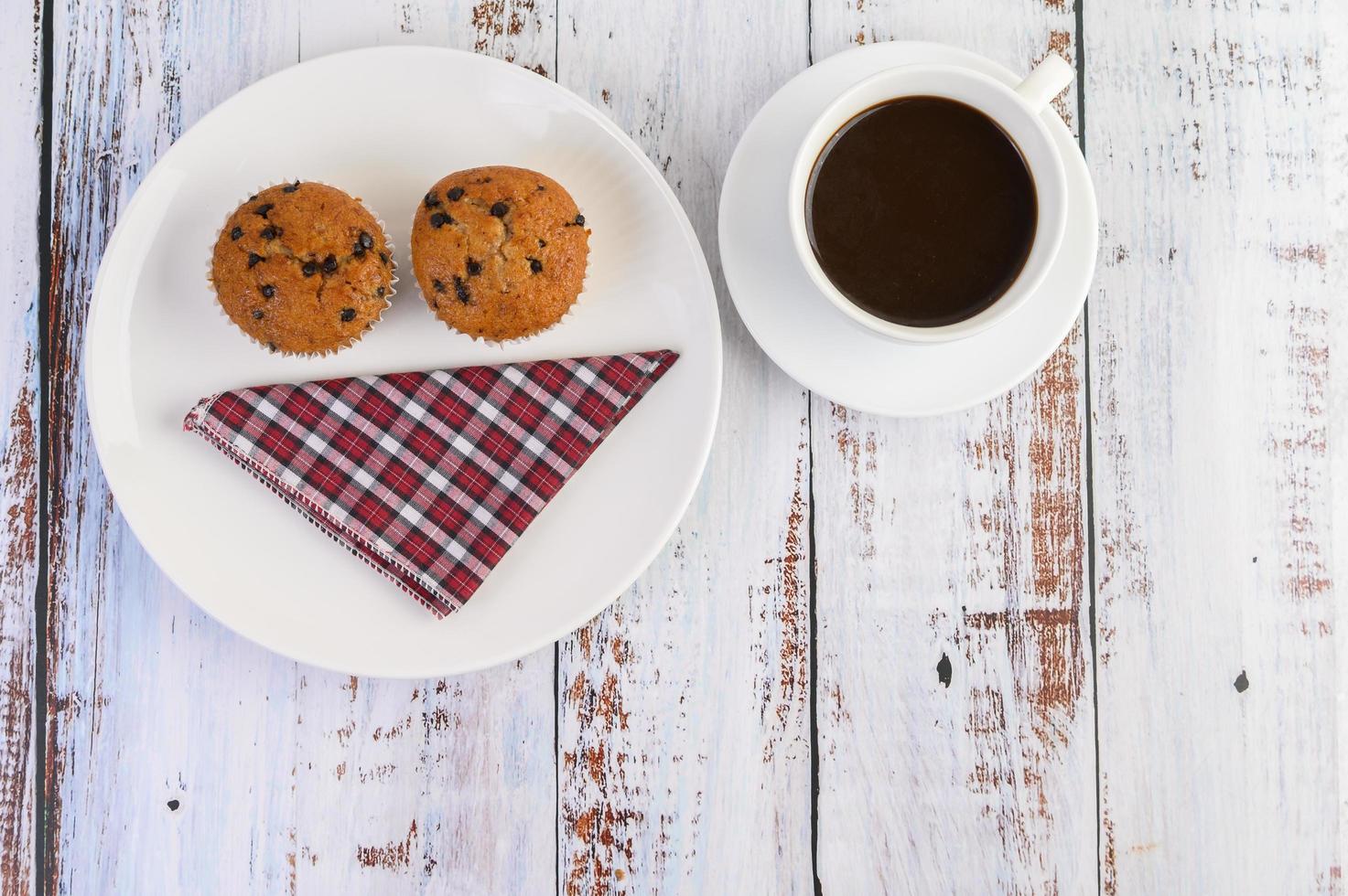 Banana cupcakes mixed with chocolate chips and coffee photo