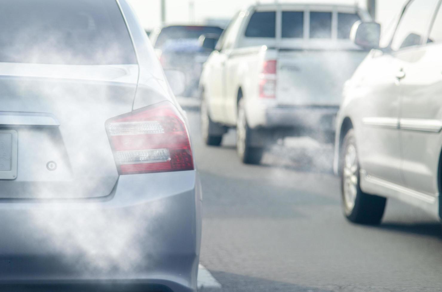 Car exhaust from cars in traffic photo