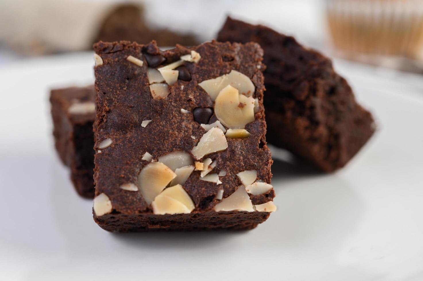 Homemade chocolate brownies on a white plate photo