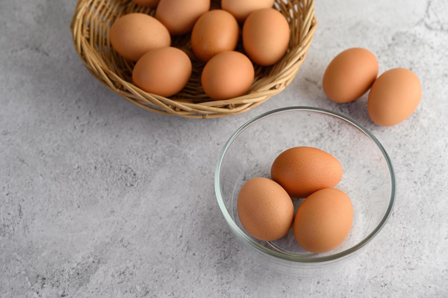 Brown eggs in a glass bowl photo