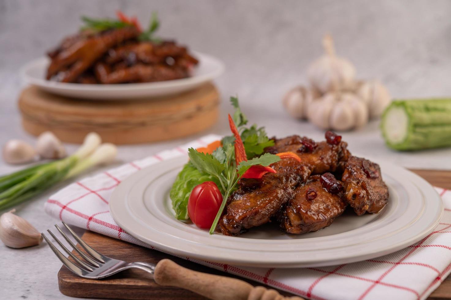 Sweet pork with chopped scallions, chili, lime, gourd, tomato and garlic photo