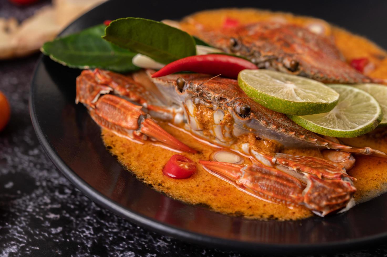 Tom yum crab with lemon, chili, tomato, garlic, lemongrass and kaffir