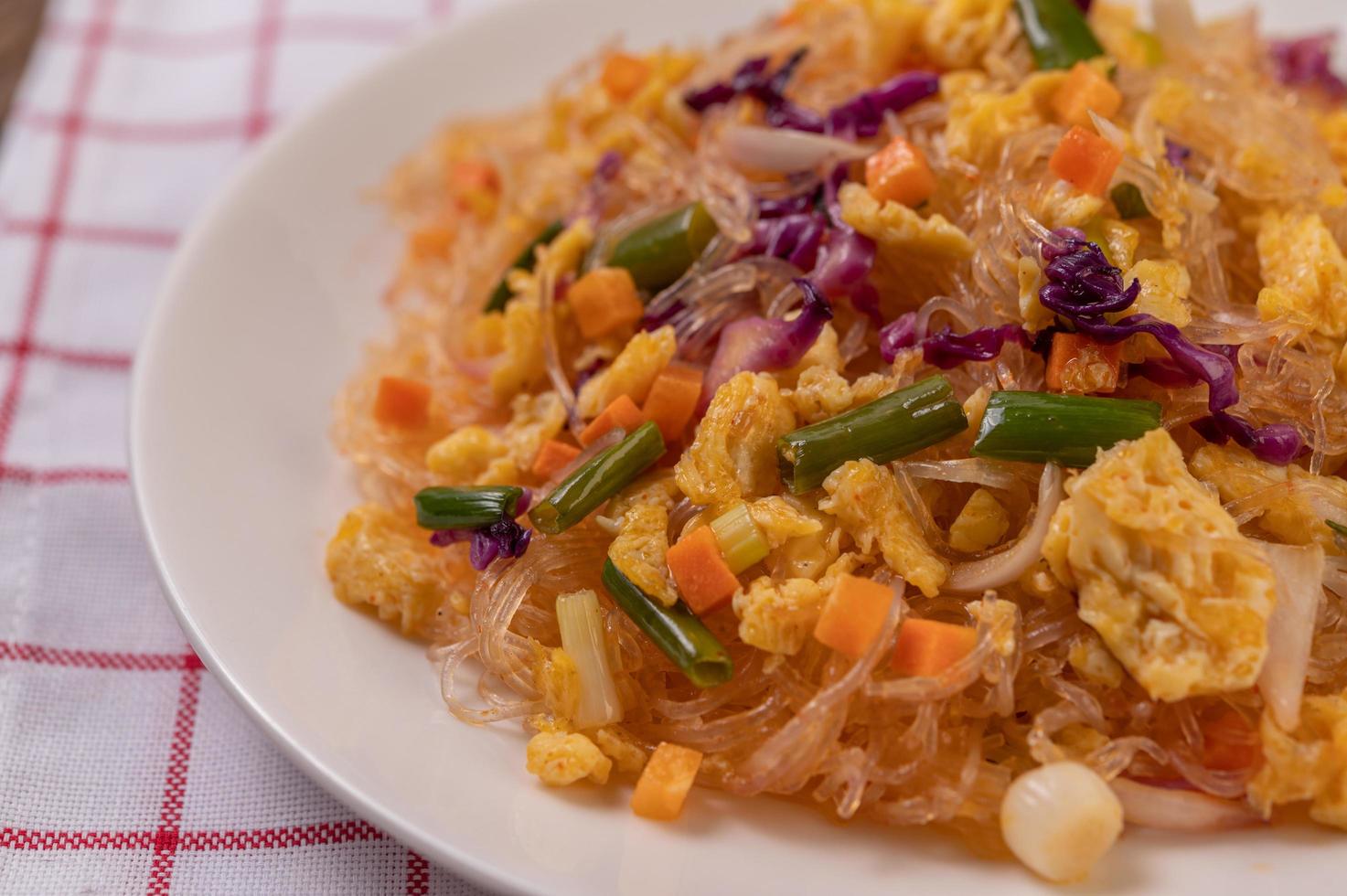 Stir fried glass noodles with eggs photo