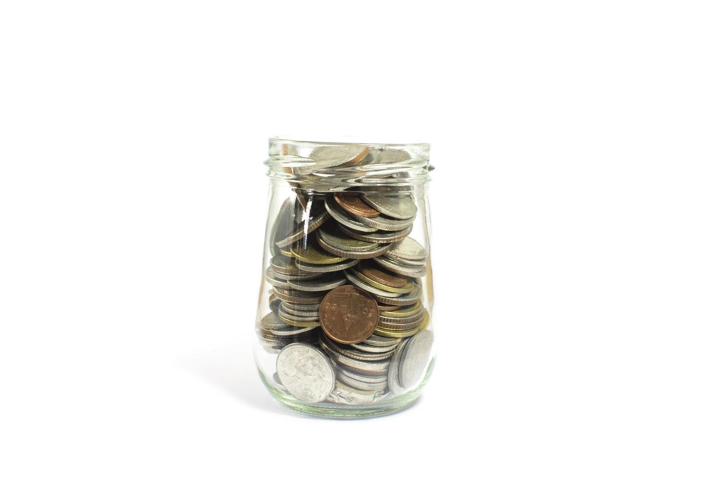 Coins in a glass jar photo