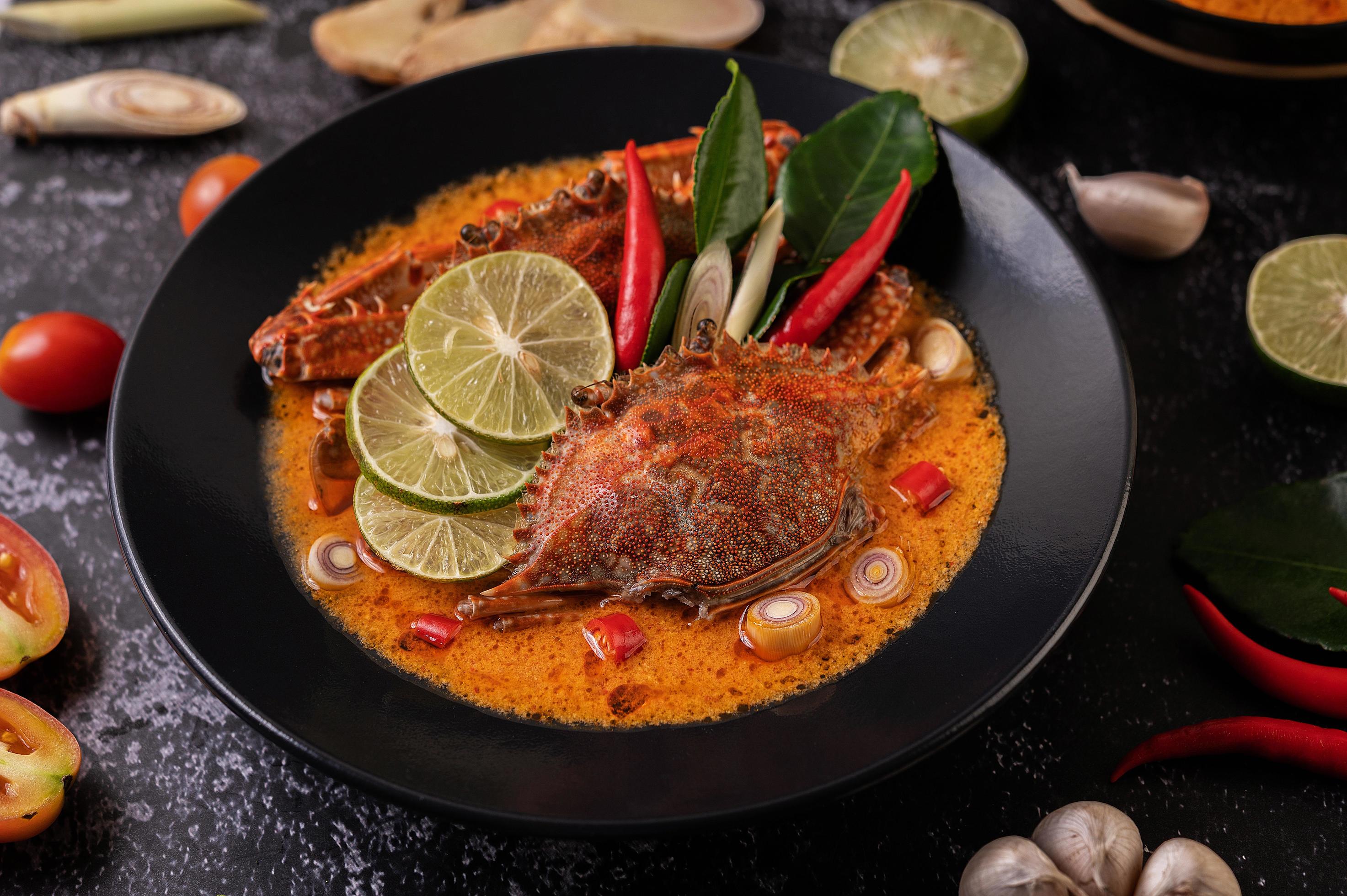 Tom yum crab with lemon, chili, tomato, garlic, lemongrass and kaffir