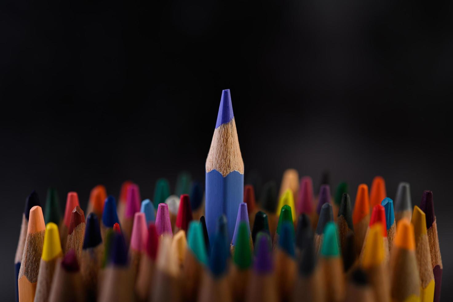 Close-up group of colored pencils, selective focus on blue photo