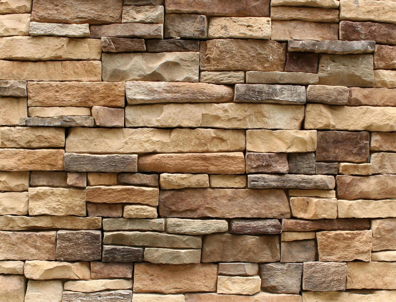 Brown stone wall background photo