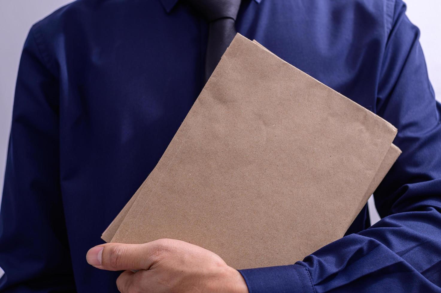 Person holding folders photo