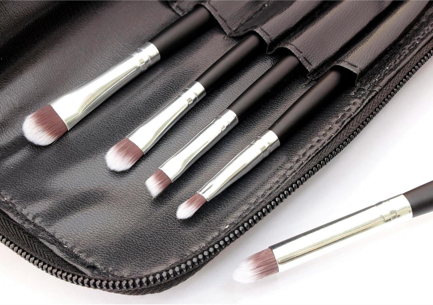 Makeup brushes in a bag photo