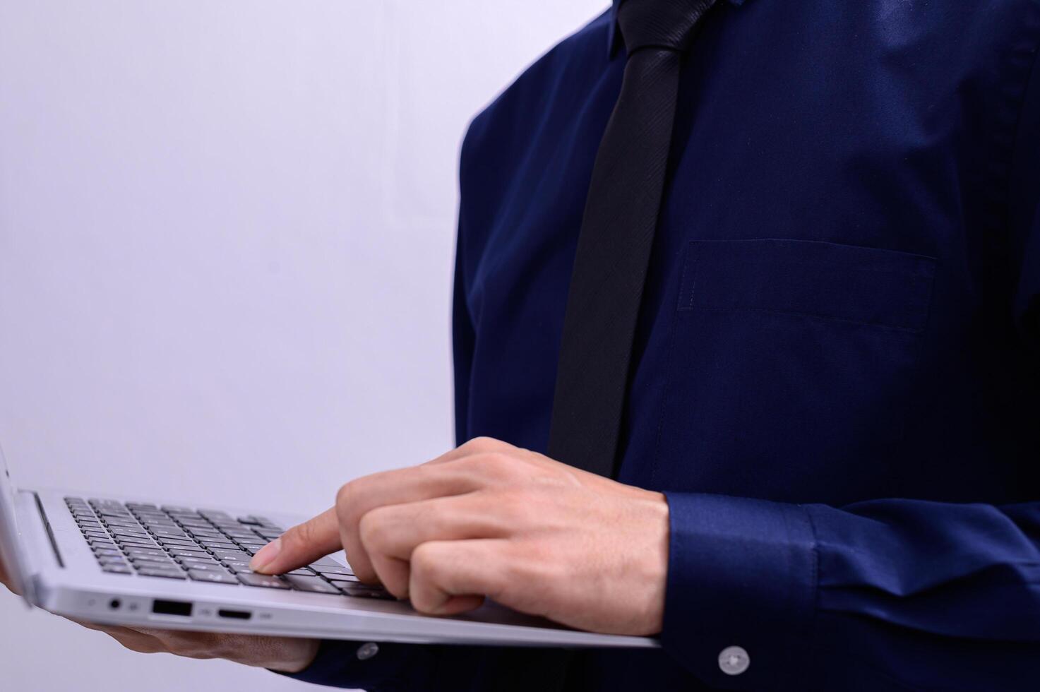 Professional holding a laptop photo