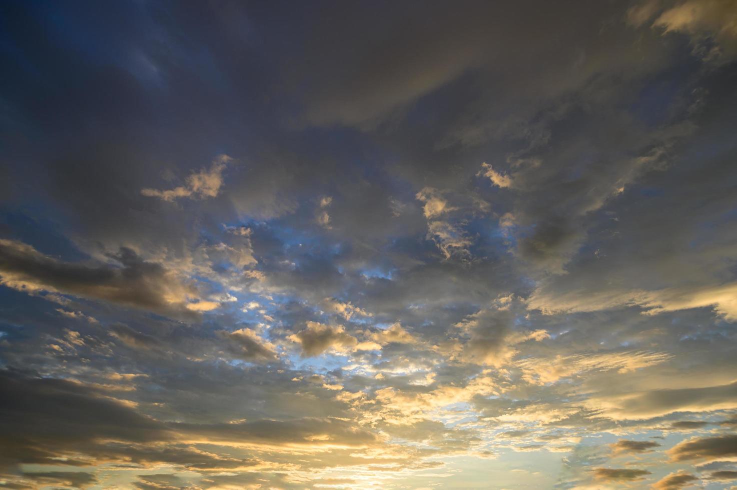 Golden clouds at sunset photo