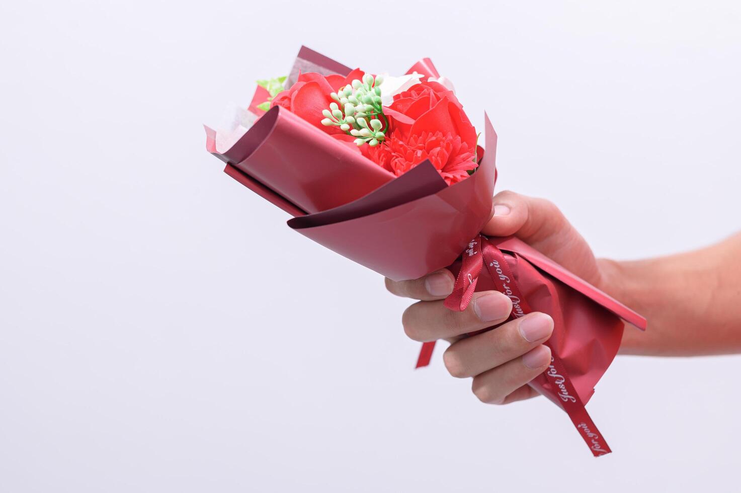 Person holding a bouquet photo