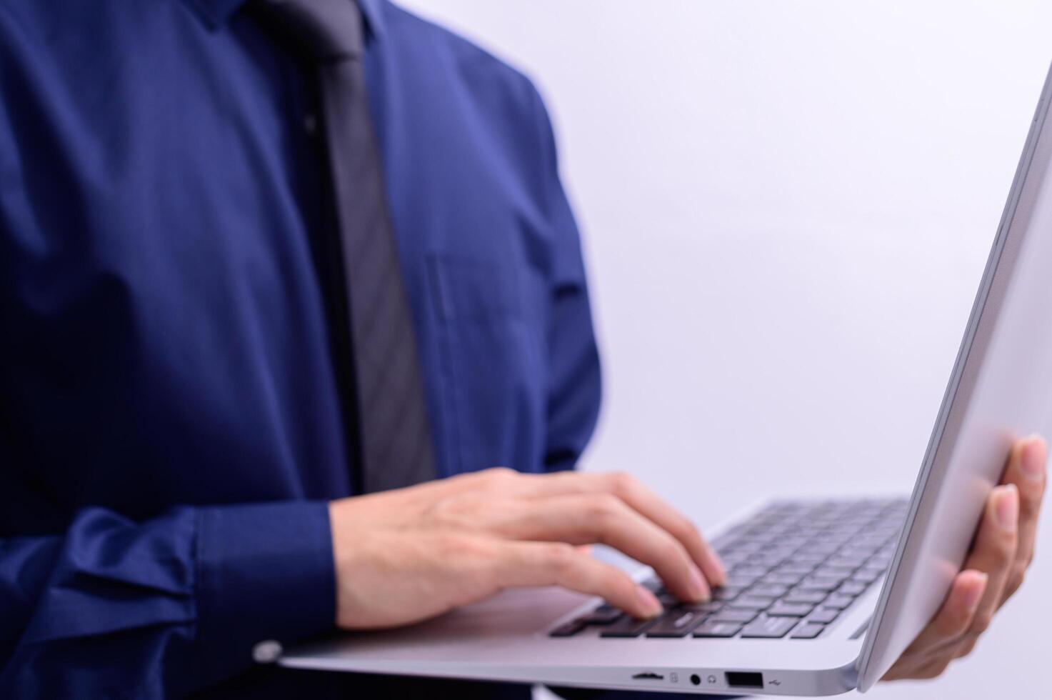 Person holding a laptop photo