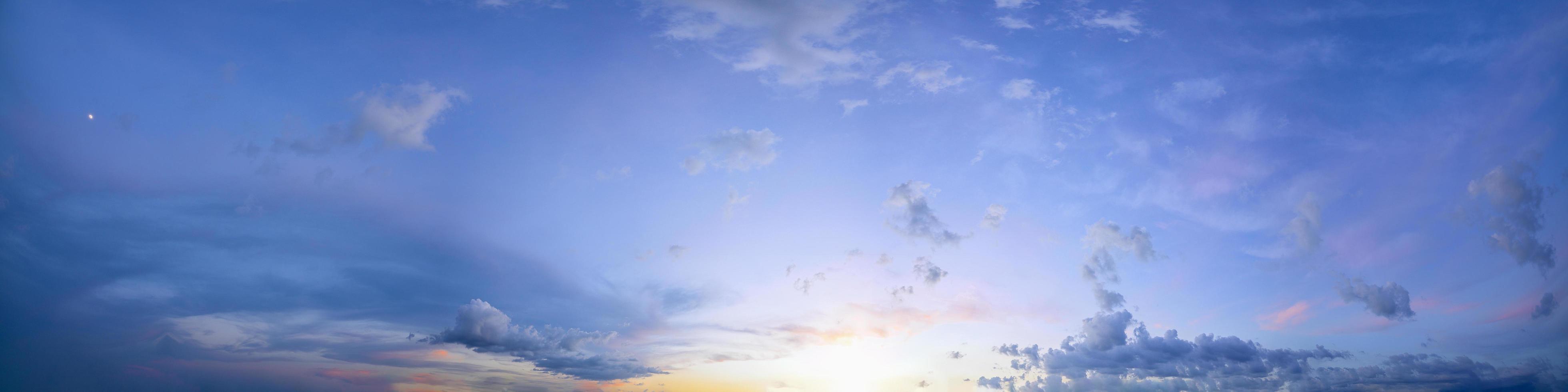 Setting sun and blue sky photo