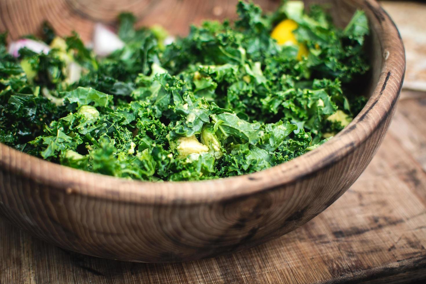 Salad in wooden bowl photo