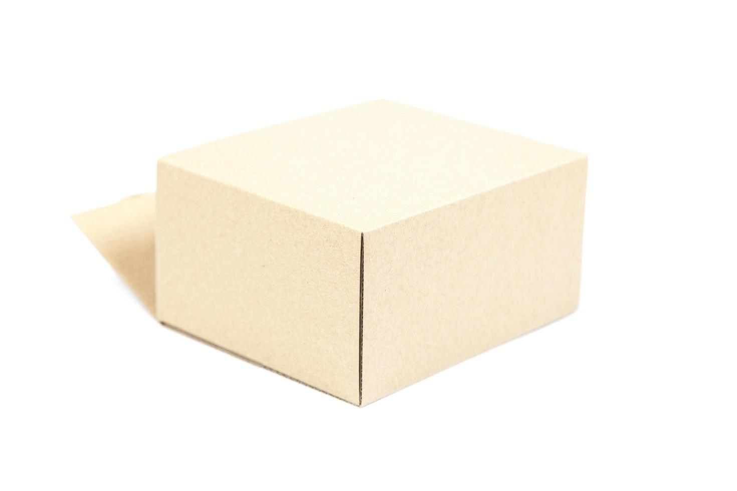 Beige paper box on white background photo