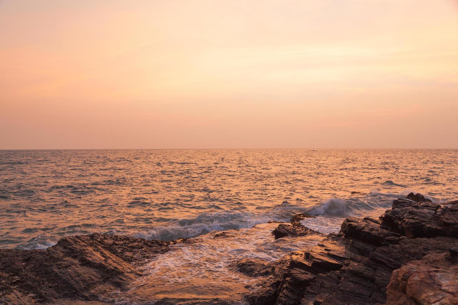 The sea at sunset photo