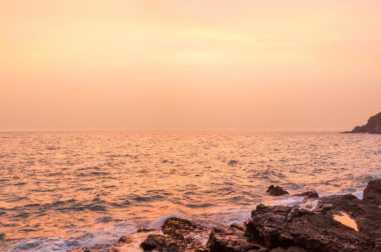 The sea at sunset photo