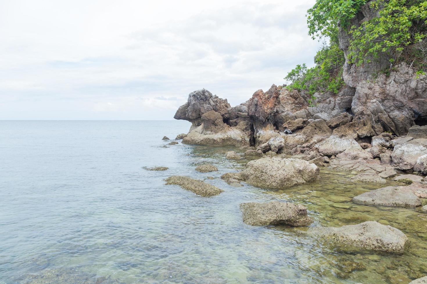 Rocky beach by the sea in Thailand photo