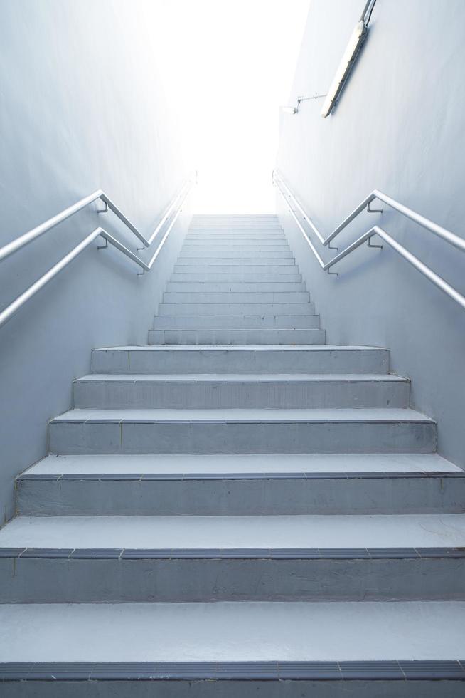 White stairs leading up photo