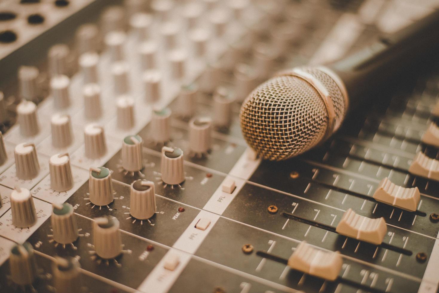 A microphone and mixing console photo