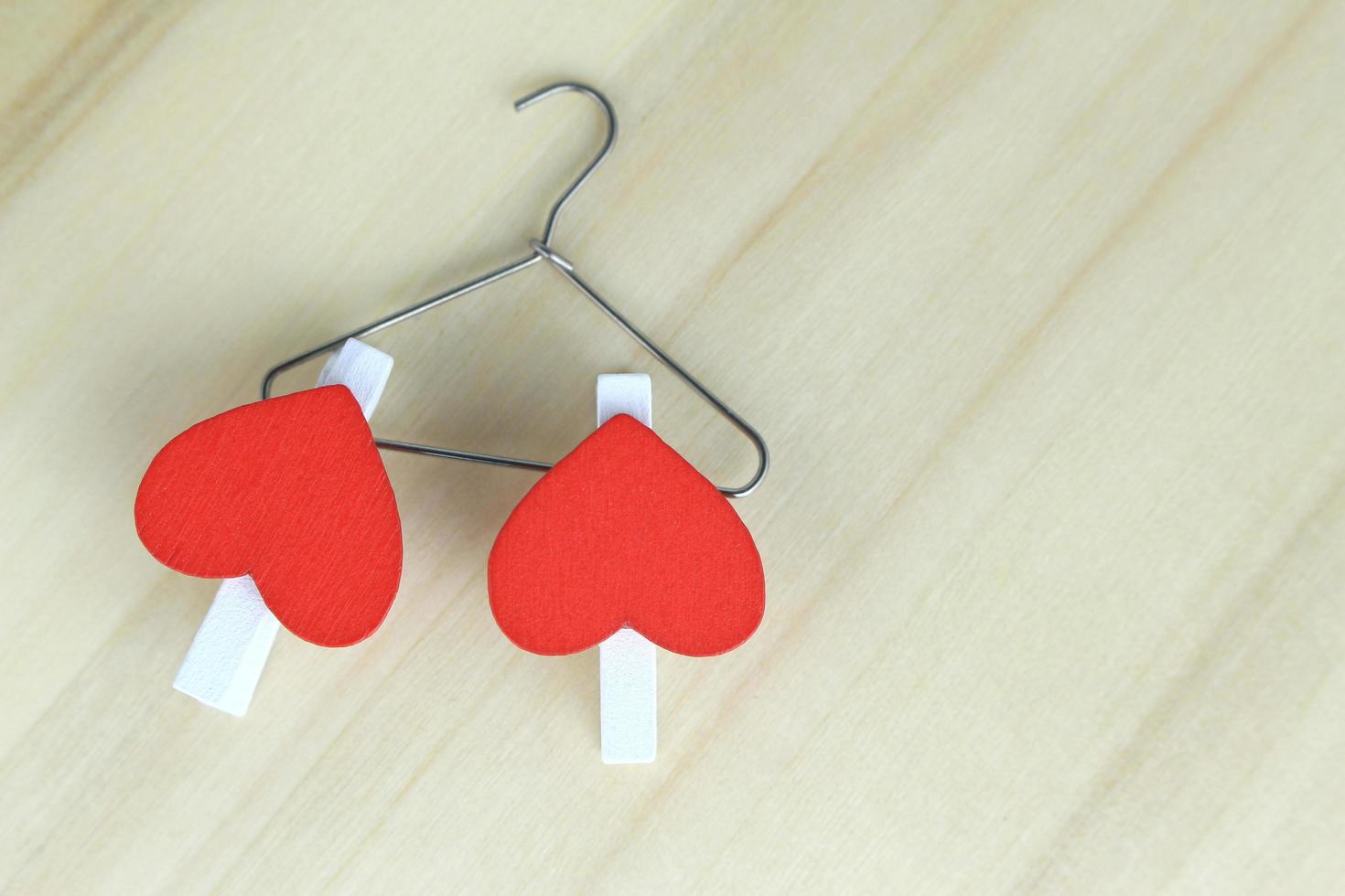 Red hearts on hanger photo