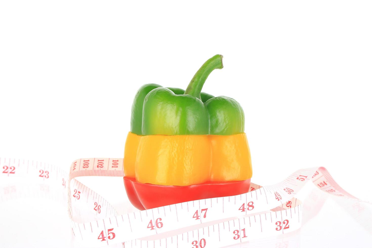 Bell pepper and measuring tape photo