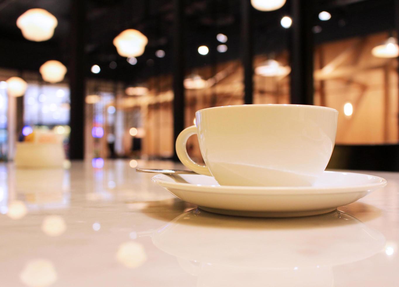 Coffee cup in coffee shop photo