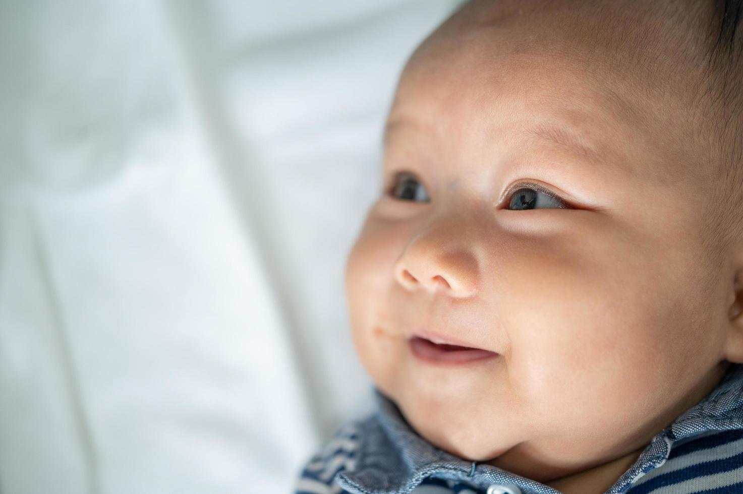 Baby smiling happily photo