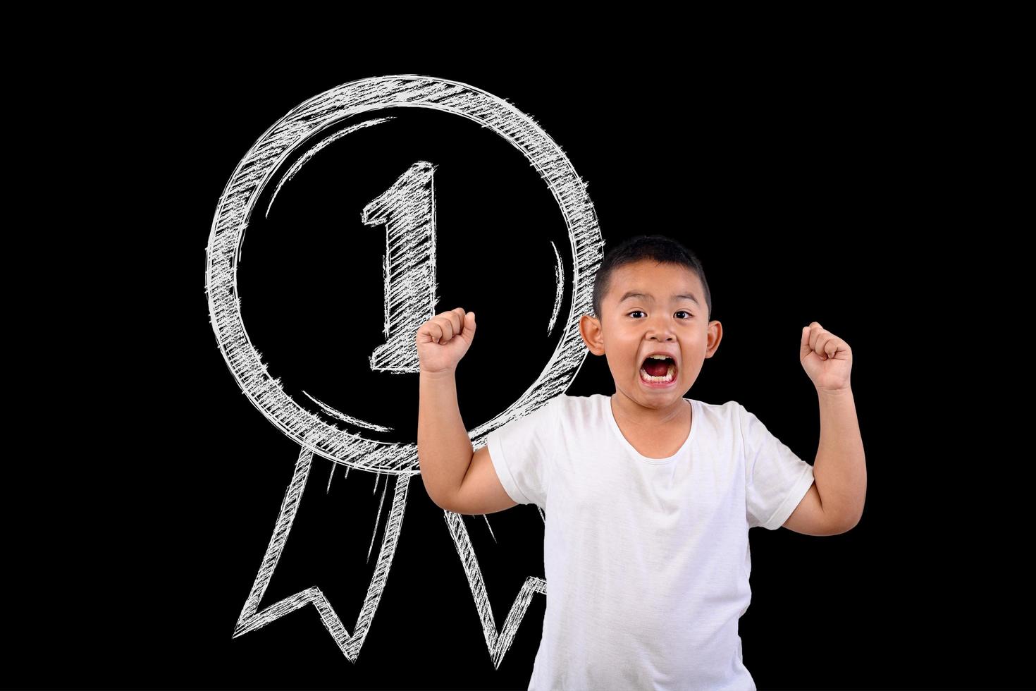 Young boy showing number 1 on a blackboard photo