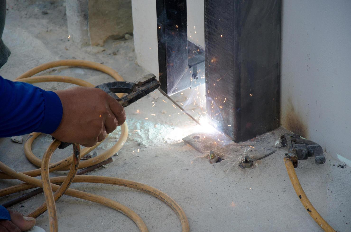 Worker welding steel photo