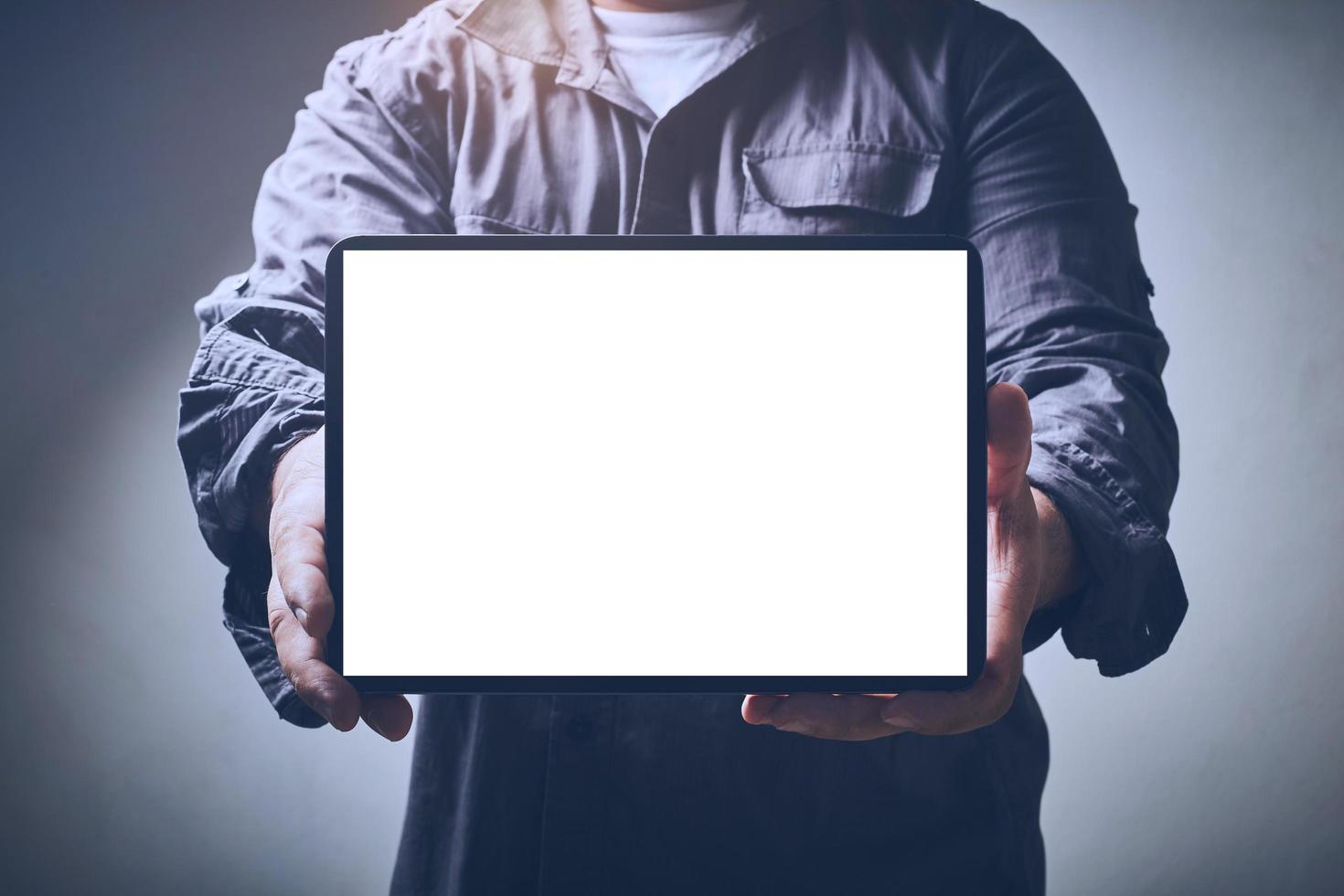 Man holding screen mock-up photo