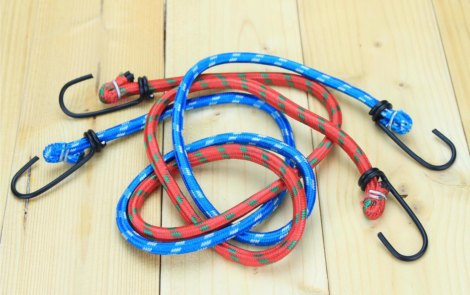 Red and blue bungee cords photo