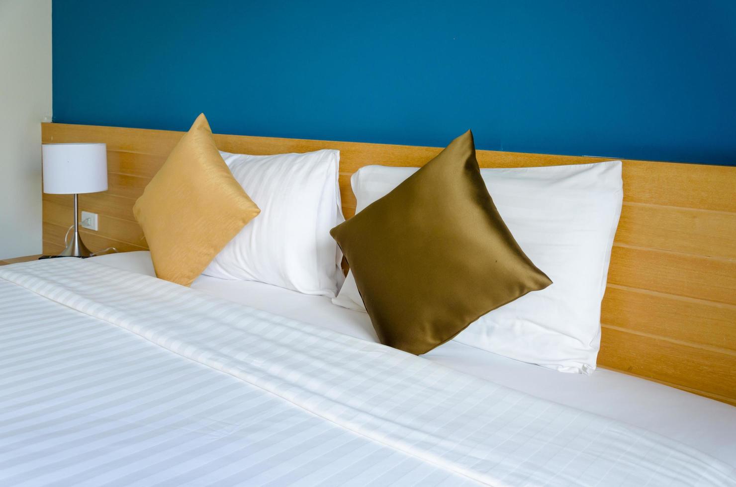 Pillows on a hotel bed photo