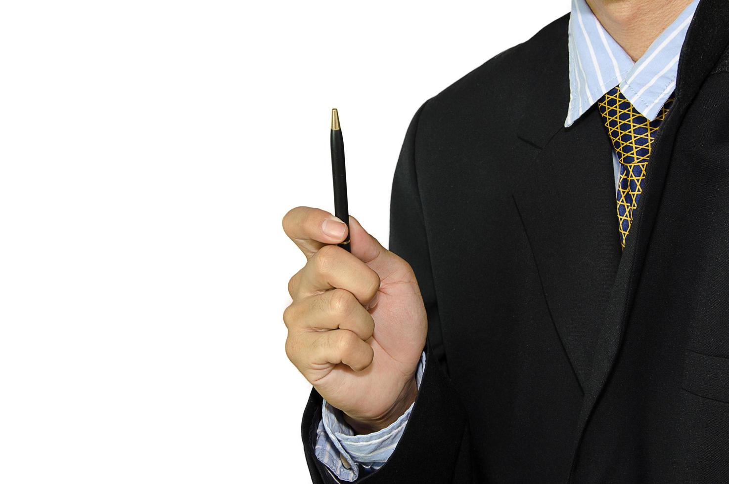 Businessman holding a pen photo