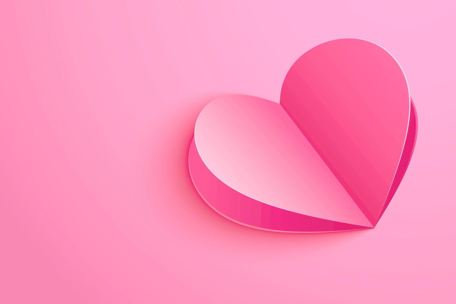 Paper heart on pink background for Valentine's day greeting card photo