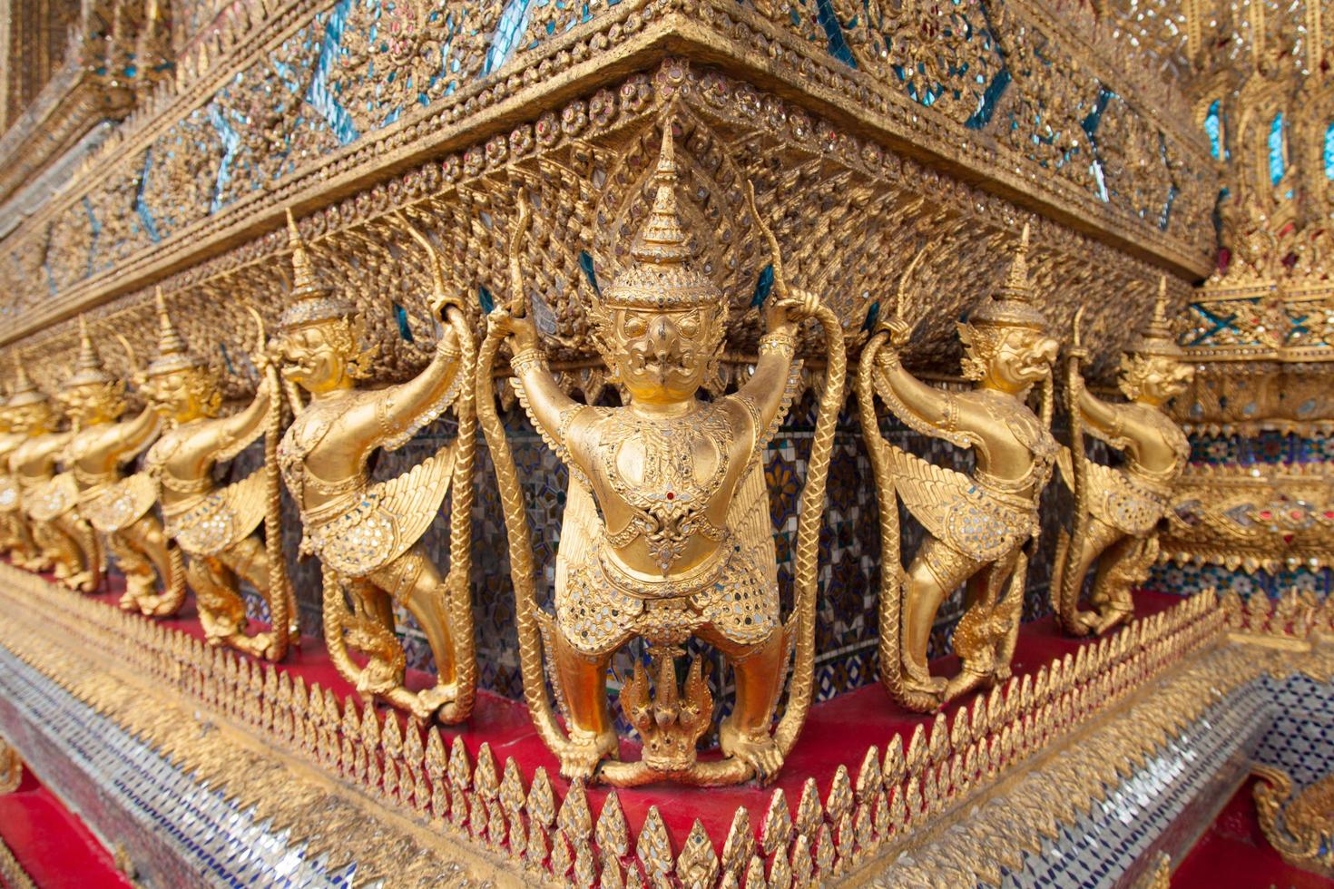 Statues in a temple in Thailand photo