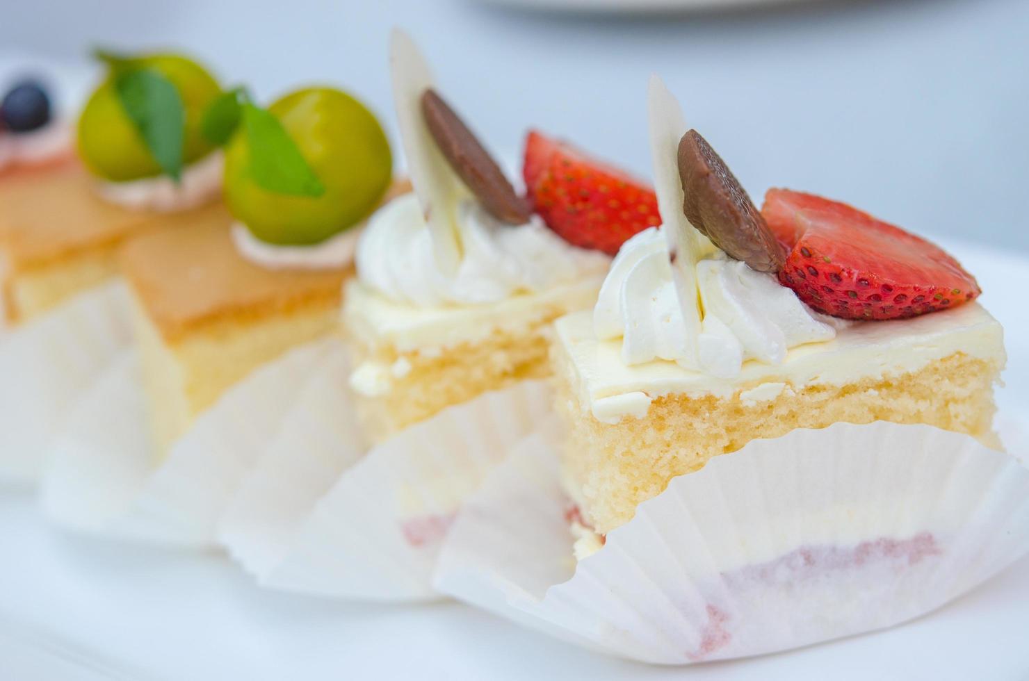 Small cakes on the table photo