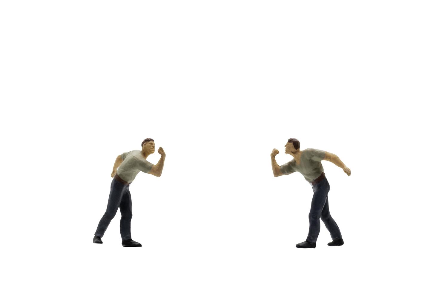Miniature figurine of two men fighting photo