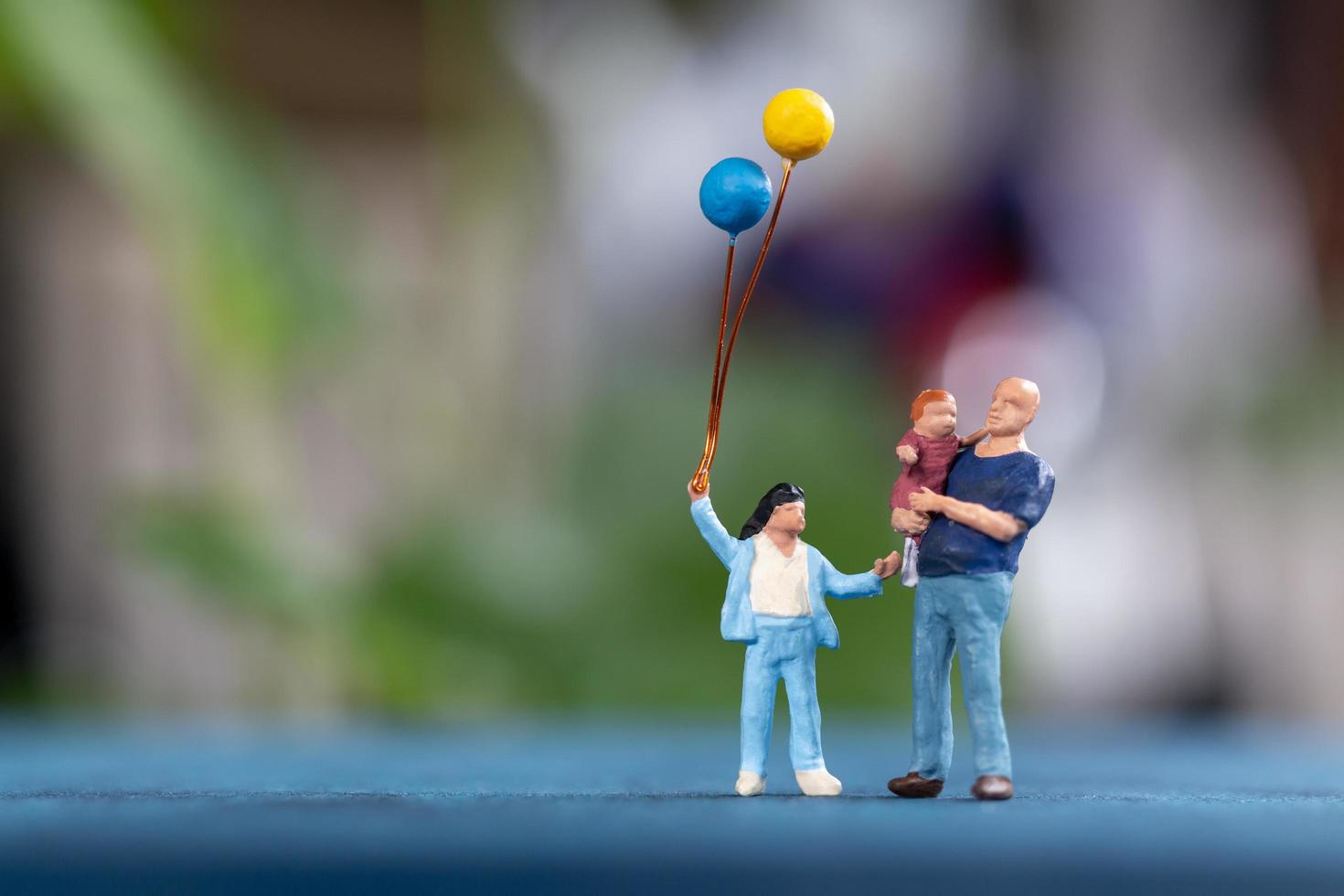 Small figurine model of a family photo