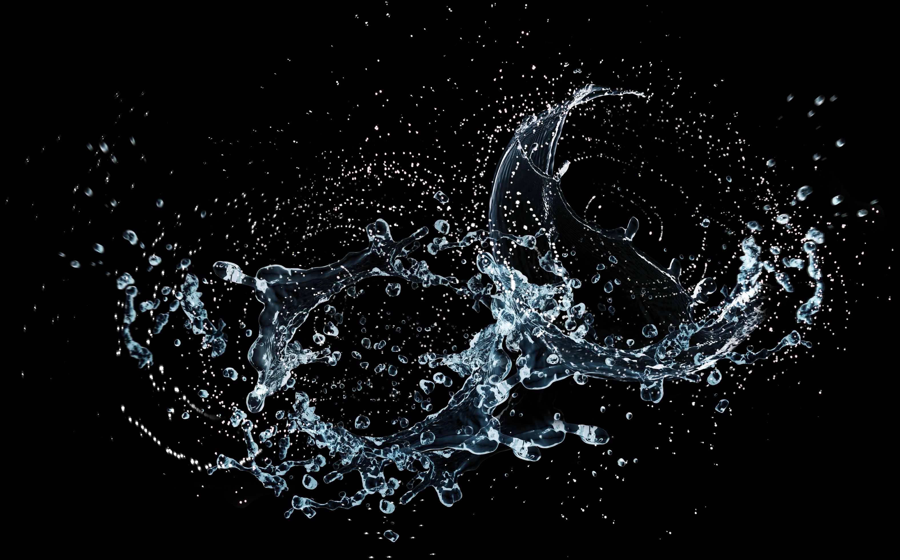 Water splash on black background 1928204 Stock Photo at Vecteezy