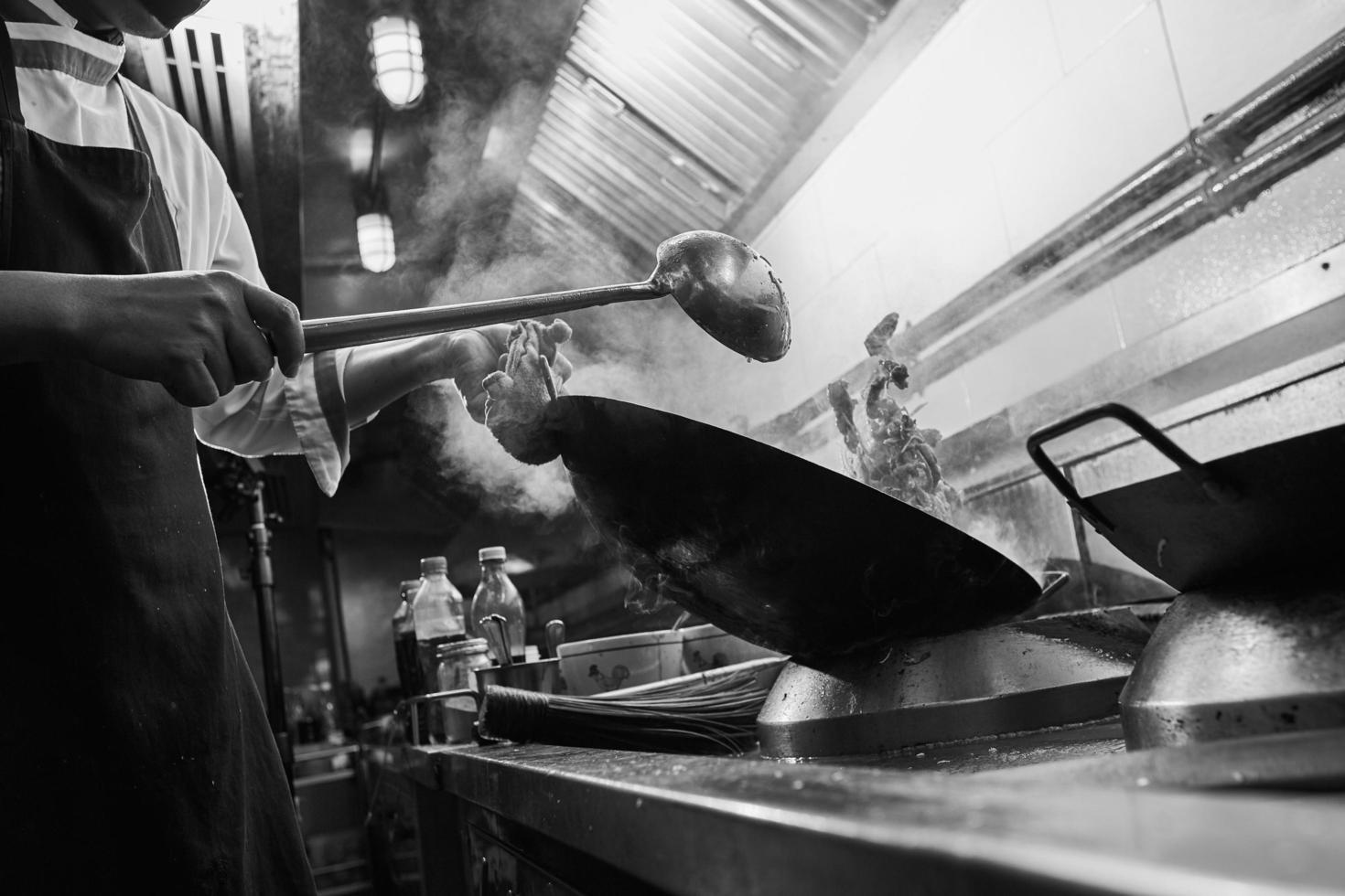 Black and white of a chef cooking photo