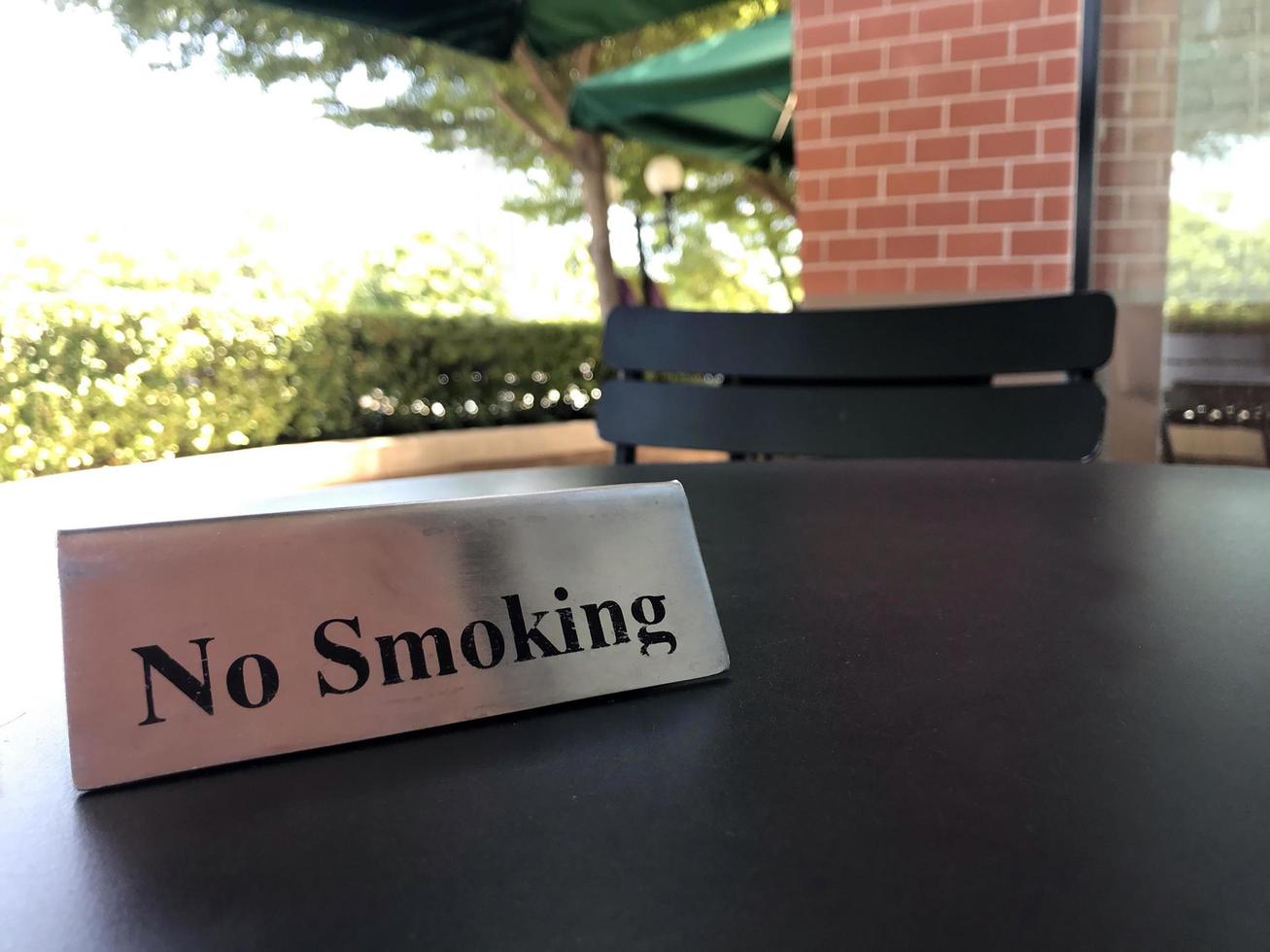 No smoking sign on a table photo