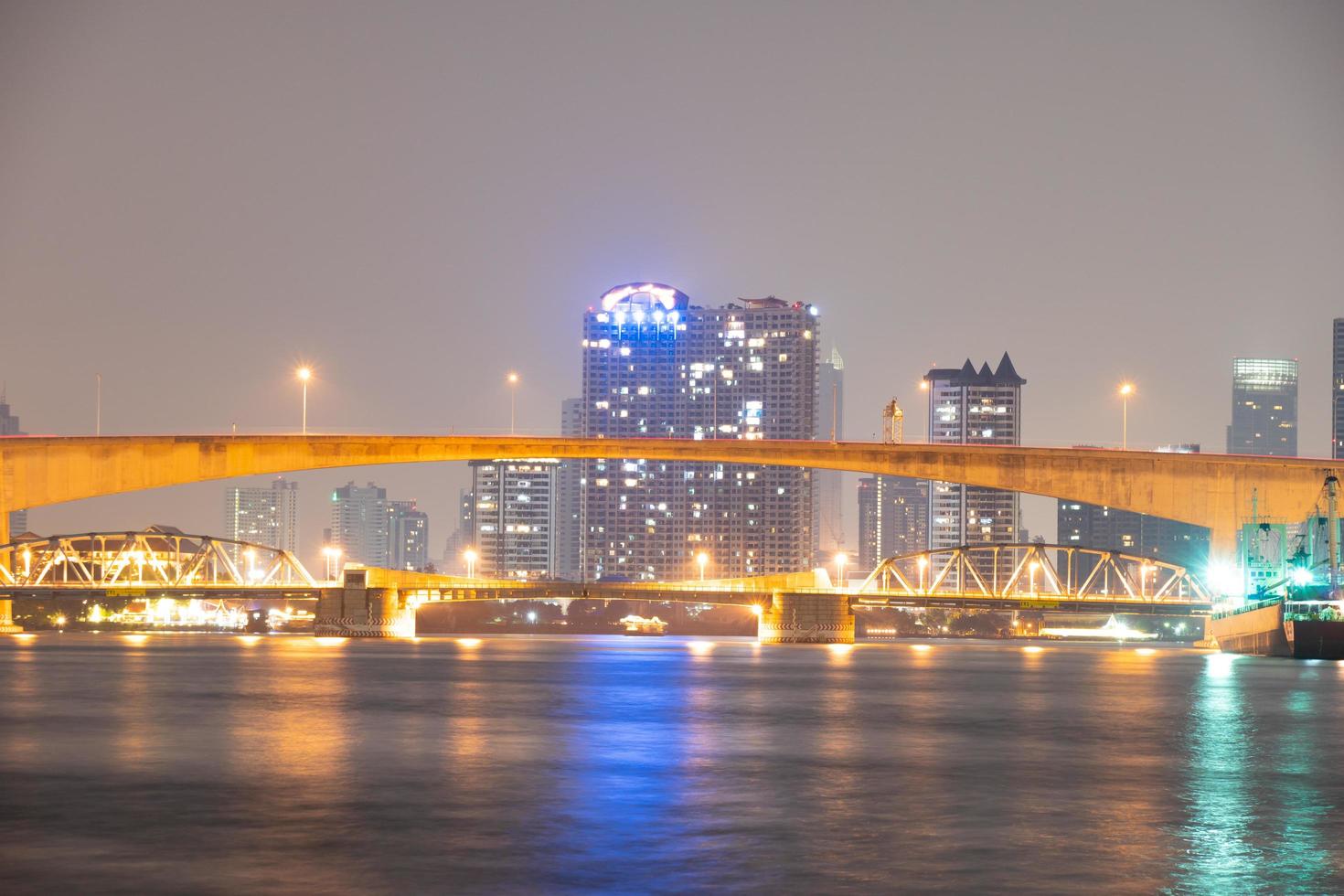 Bridge over the river in Bangkok city photo