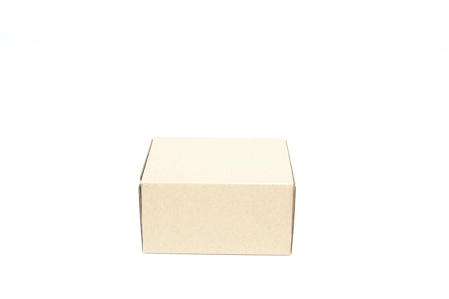 Brown paper box on white background photo