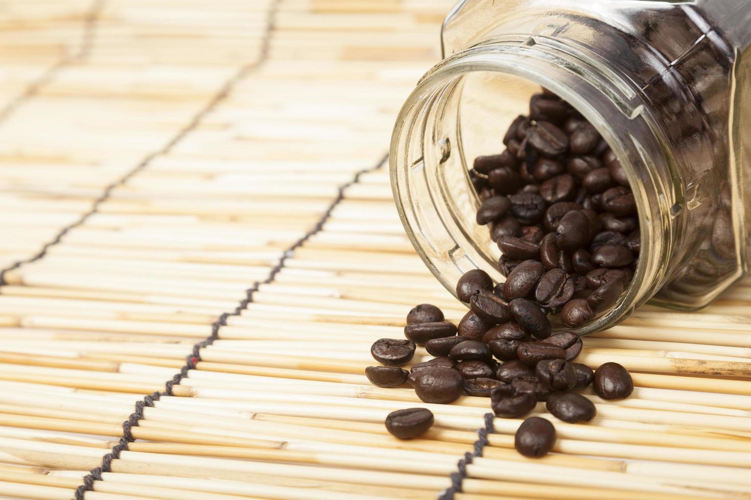 Bottle of coffee beans photo