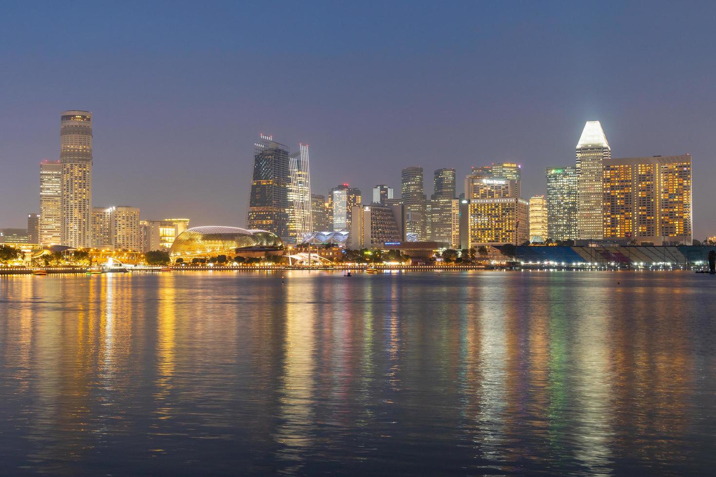 Buildings of Singapore at night photo